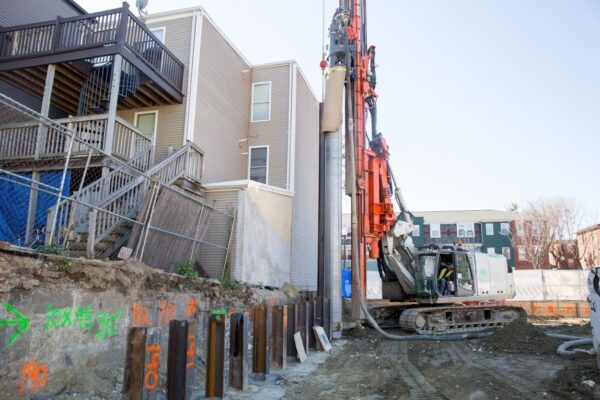 secant pile wall being constructed in south boston